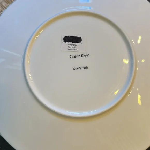 Calvin Klein white Dinner Plate with gold Accents